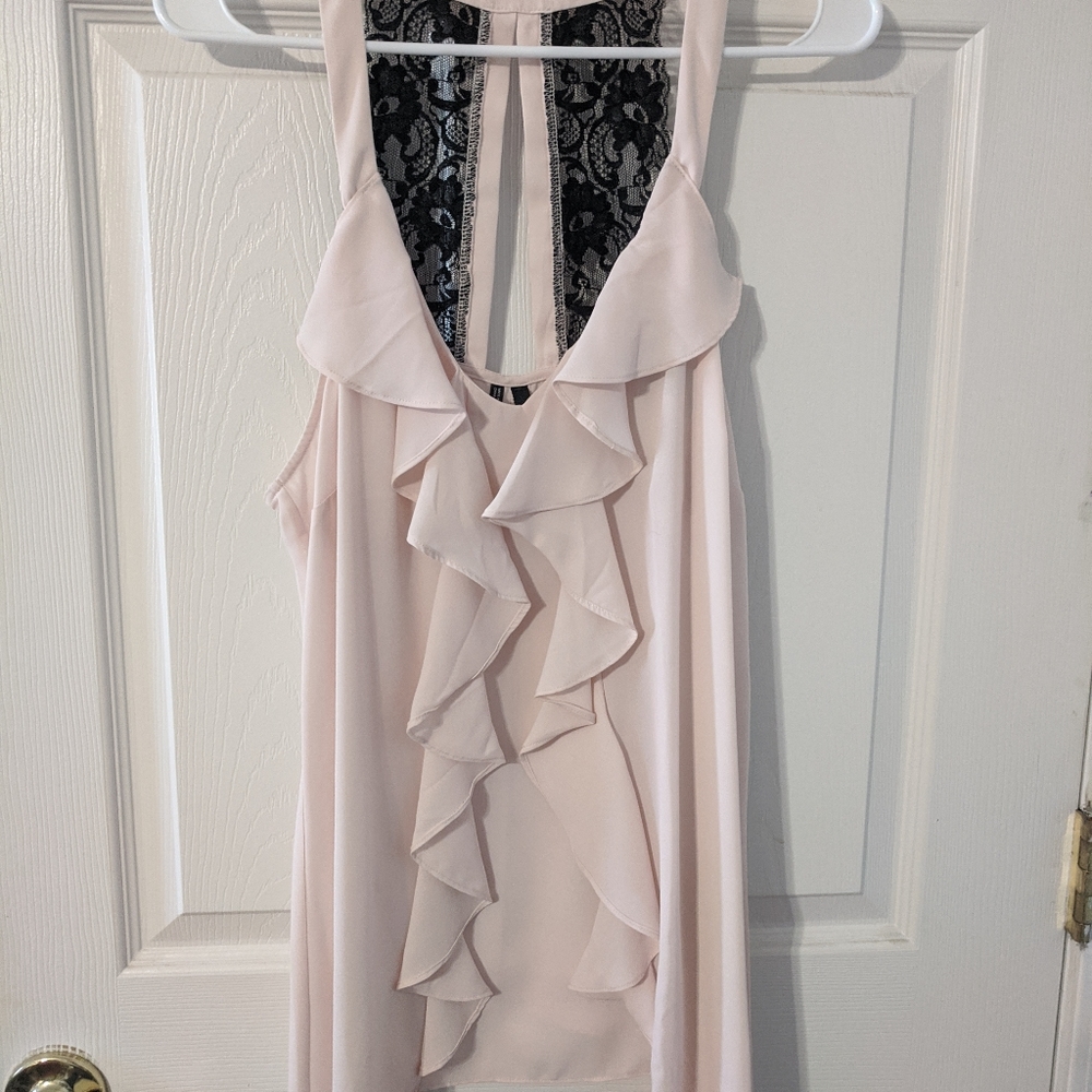 Blush colored top with black lace